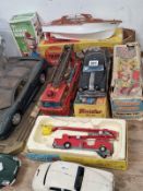 A BATTERY OPERATED CAR, OTHER CARS, A TIN PLATE AND A CORGI FIRE ENGINE TOGETHER WITH A TRIANG