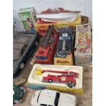 A BATTERY OPERATED CAR, OTHER CARS, A TIN PLATE AND A CORGI FIRE ENGINE TOGETHER WITH A TRIANG