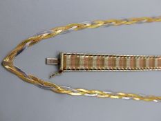 A HALLMARKED 9ct GOLD TRI COLOUR BRACELET LENGTH 18cm TOGETHER WITH A SIMILAR STYLED PLAITED