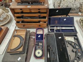 A SEVEN DRAWER CHEST OF AND WITH BOXED MICROMETERS