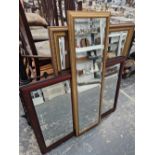 THREE FRAMED RECTANGULAR BEVELLED GLASS MIRRORS