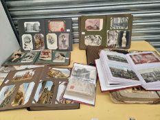 NINE ALBUMS AND SOME SHEETS OF POSTCARDS AND PHOTOGRAPHS