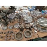 TEN SILVER HELD DRINKING GLASSES, FOUR SILVER TOPPED DRESSING TABLE BOTTLES, MEAT DISH COVERS AND