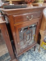 AN EDWARDIAN GLAZED CABINET