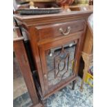 AN EDWARDIAN GLAZED CABINET