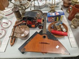 A BALAIKA, BRASS SCALES, A MINERS LAMP, A MODEL VINTAGE CAR, A COPPER KETTLE, A SHUTTLE, ETC.