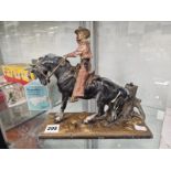 A COLOURED SPELTER COWBOY TABLE LIGHTER