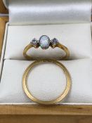 AN 18ct GOLD OPAL AND DIAMOND RING, MARKS RUBBED, SIZE P, TOGETHER WITH A 22ct GOLD WEDDING BAND,