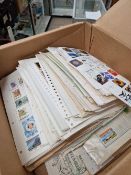 A QUANTITY OF ALL WORLD STAMPS ON ALBUM PAGES.