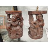 A PAIR OF CRAVED WOOD MALAYSIAN FIGURES