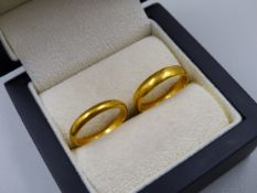 TWO 22ct HALLMARKED GOLD WEDDING RINGS, FINGER SIZES K AND L, GROSS WEIGHT 7.07grms.