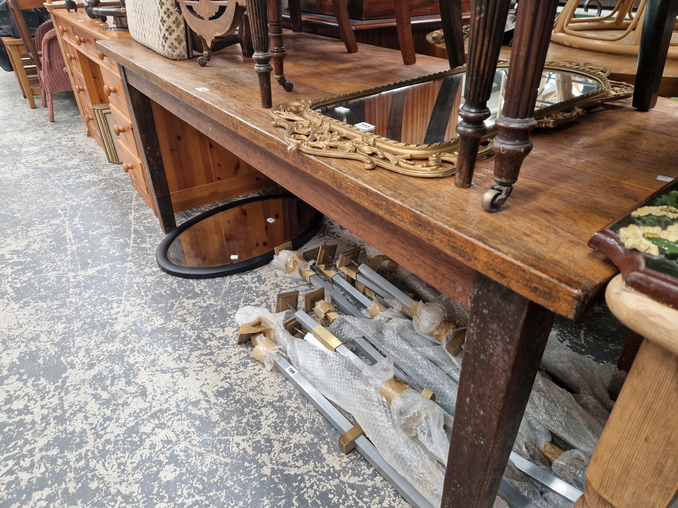 AN OAK REFECTORY TABLE SUPPORTED ON FOUR TAPERING SQUARE LEGS. W 184 x D 74 x H 74cms.