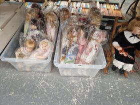 A QUANTITY OF MID 20th C. BISQUE HEADED DOLLS AND STANDS
