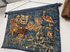 A MACHINE WOVEN TAPESTRY DEPICTING NEPTUNE BY A GALLEON AND AMONGST FISHES