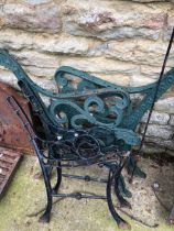 TWO PAIRS OF PAINTED METAL BENCH ENDS.