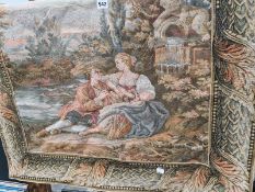 A MACHINE MADE TAPESTRY DEPICTING AN 18th C. COUPLE SEATED BY A RIVER