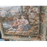 A MACHINE MADE TAPESTRY DEPICTING AN 18th C. COUPLE SEATED BY A RIVER