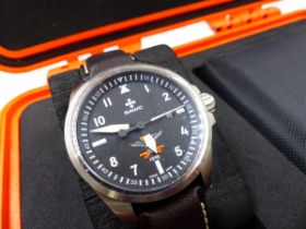 A SAWC WRIST WATCH COMPLETE WITH ORIGINAL HARD ORANGE TRAVEL CASE, WATCH TOOLS, SPARE STRAP,