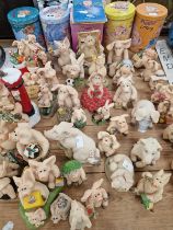 A COLLECTION OF PIGGIN FIGURINES