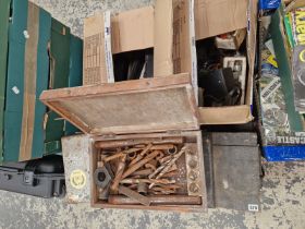 A WOODEN TOOL CHEST WITH TOOLS AND SHOE LASTS, A CASED ELECTRIC SAW