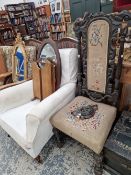 A CARVED FRAME HIGH BACK CHAIR AND A VICTORIAN ARMCHAIR.