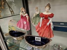 THREE DOULTON FIGURES, A BOXED WORCESTER CIGARETTE SET AND A PAIR OF SILVER DISHES WITH BLUE GLASS