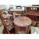 AN ORIENTAL HARDWOOD CARVED NEST OF 4 TABLES, A FOLDING CAKE STAND, A SMALL BOOKCASE AND AN