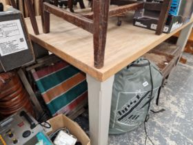 AN OAK RECTANGULAR TABLE ON GREY PAINTED LEGS