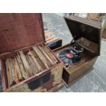 AN OAK CASED HMV WIND UP GRAMOPHONE TOGETHER WITH WOODEN CHEST OF 75RPM RECORDS