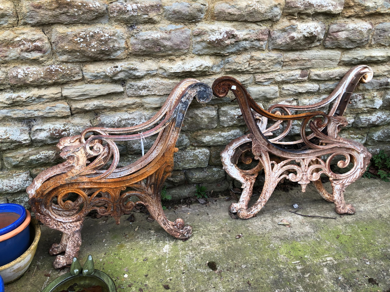 TWO PAIRS F METAL BENCH ENDS.