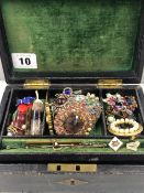 A COLLECTION OF ANTIQUE AND LATER BROOCHES, CLIPS, STICK PINS ETC, CONTAINED IN A VINTAGE LEATHER