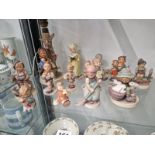 TWELVE HUMMEL FIGURINES TOGETHER WITH A DUCK FIGURE