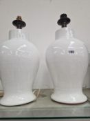 A PAIR OF WHITE GLAZED BALUSTER JARS AS TABLE LAMPS