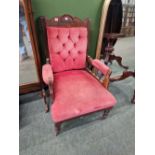 A VICTORIAN ARM CHAIR