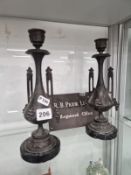 A PAIR OF VICTORIAN SPELTER TWO HANDLED VASES TOGETHER WITH A REGIONAL OFFICE SIGN