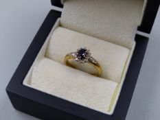 A 9ct HALLMARKED GOLD SAPPHIRE AND DIAMOND CLUSTER RING, FINGER SIZE O 1/2, WEIGHT 2.96grms.