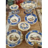 A 19th C. ENGLISH PORCELAIN DESSERT SERVICE PAINTED WITH LANDSCAPES WITHIN GILT BLUE BANDS