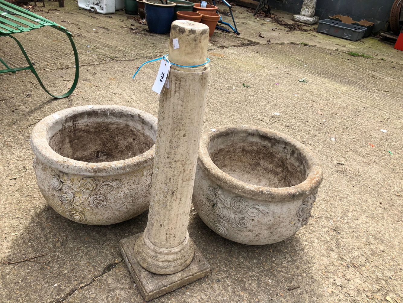 TWO RECONSTITUTED STONE PLANTERS TOGETHER WITH A COLUMN SUNDIAL