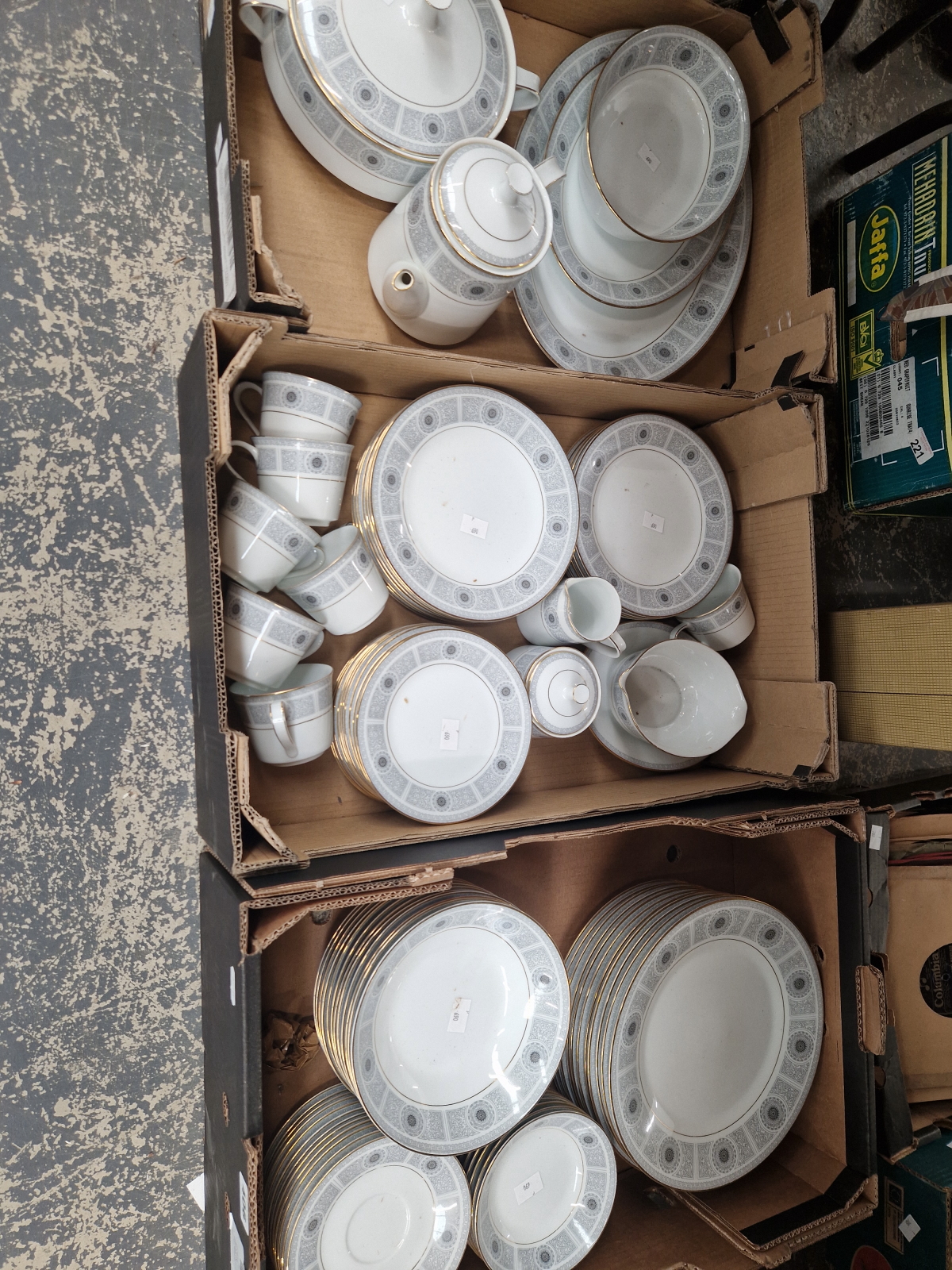 A NORITAKE DINNER SERVICE WITH BLACK CHEQUER BORDER BANDS