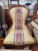 A VICTORIAN MAHOGANY SHOW FRAME SPOON BACKED CHAIR TOGETHER WITH A FOOTSTOOL