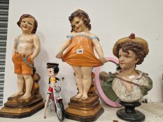 FIGURES OF A BOY AND A GIRL WEARING ORANGE CLOTHING, A BUST OF A CHILD TOGTHER WITH BETTY BOOP