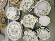 A QUIMPER POTTERY PART BREAKFAST SET PAINTED IN TONES OF GREEN