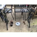 A CAST IRON SEWING MACHINE BASE TOGETHER WITH A LEAD SUNDAIL AND VARIOUS WEIGHTS.