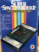 A SUPER SPACE INVADER 2 ELECTRONIC COLOUR HAND HELD GAME