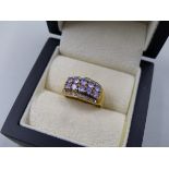 A 9ct HALLMARKED GOLD TANZANITE AND DIAMOND HALF HOOP RING. FINGER SIZE P. WEIGHT 3.30grms.