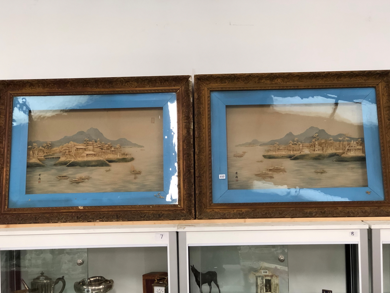 A PAIR OF CHINESE CUT CORK PICTURES OF ISLANDS DEPICTED WITHIN BLUE SLIPS AND GILT FRAMES. 77 x 10