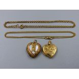 A 9ct HALLMARKED GOLD LOCKET WITH A FOLIATE PATTERN TO FRONT SUSPENDED ON A 9ct GOLD BELCHER LINK