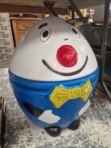 A PLASTIC HUMPTY DUMPTY FORM BOX