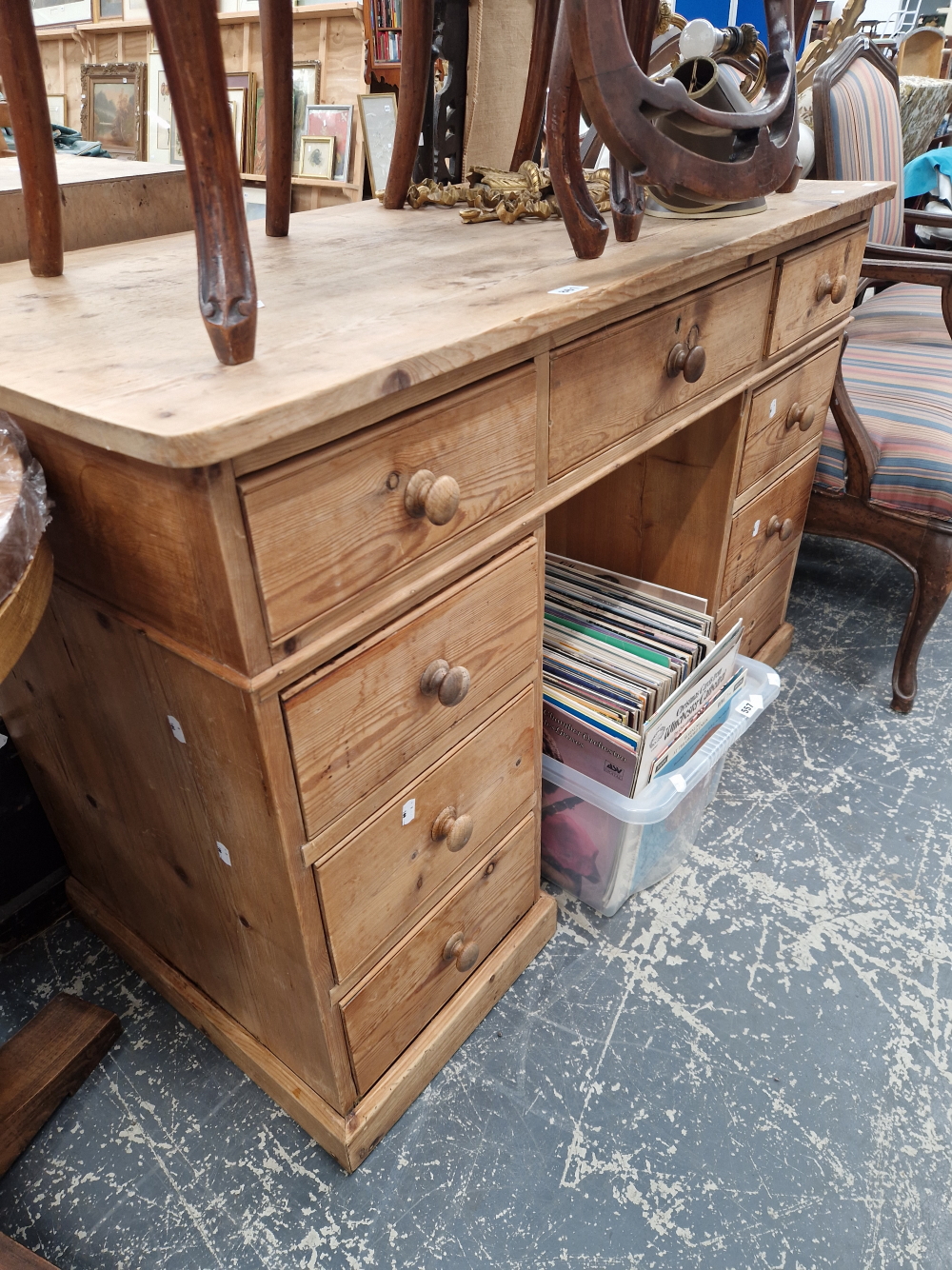 AN ANTIQUE PINE PEDESTAL DESK