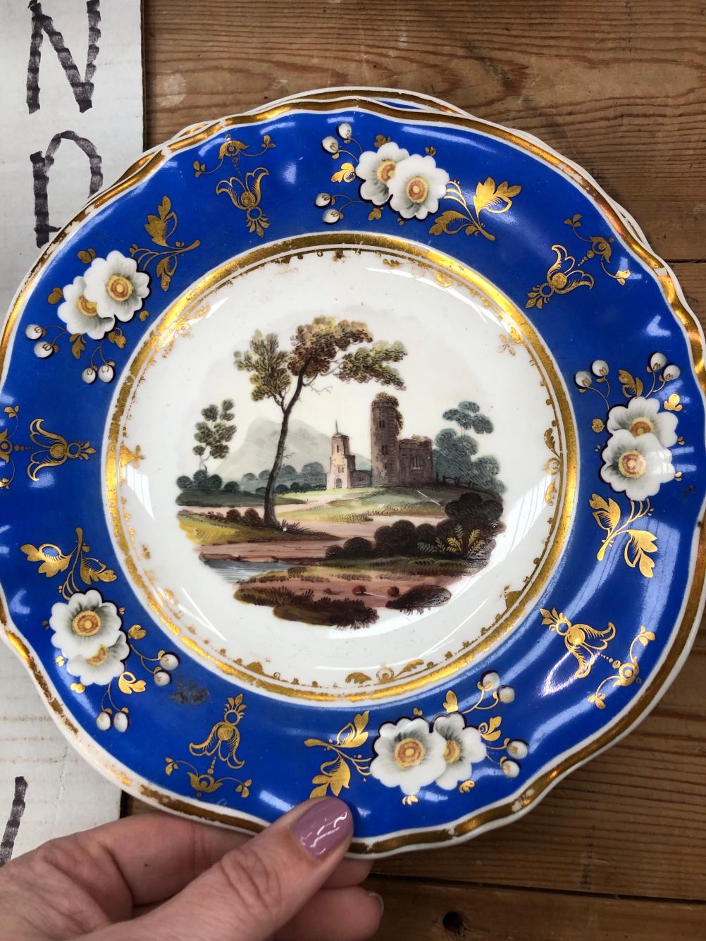 A 19th C. ENGLISH PORCELAIN DESSERT SERVICE PAINTED WITH LANDSCAPES WITHIN GILT BLUE BANDS - Image 16 of 27